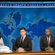 Tina Fey, Colin Jost, and Michael Che at the Weekend Update desk last night (Photo: Will Heath/NBC/NBCU Photo Bank via Getty Images)